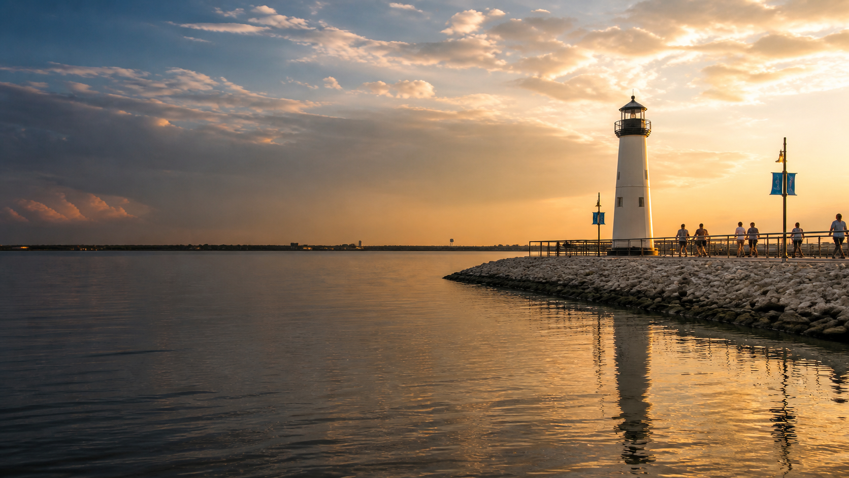 The lighthouse and waterfront at The Harbor on Lake Ray Hubbard at golden hour